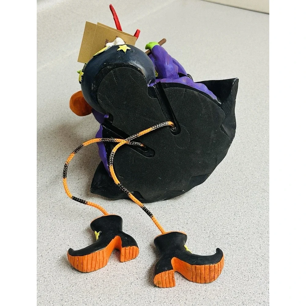 Halloween Happy Witch Holding Pumpkin With A Black Cat Ready To Cook A Frog